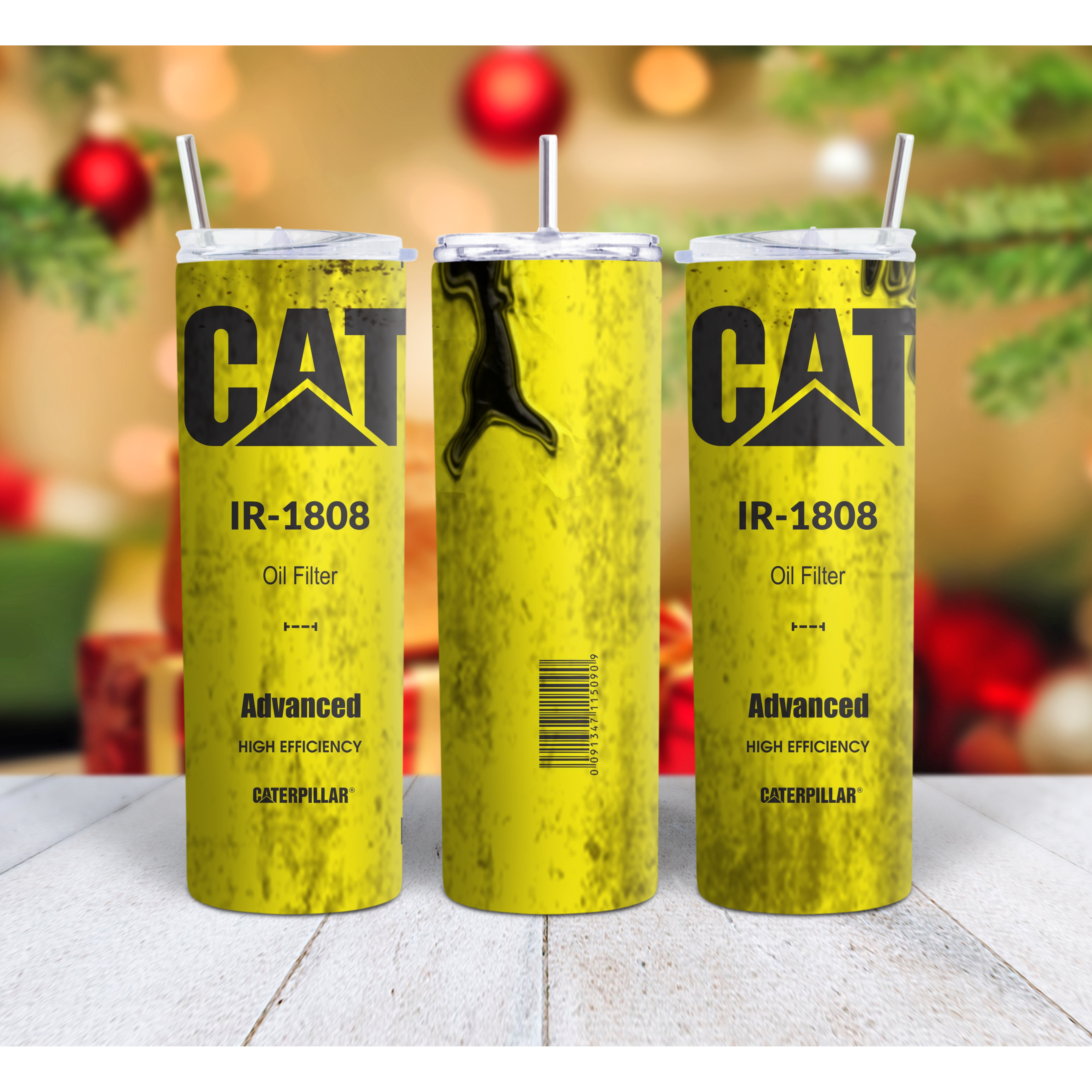  yellow oil filter containers with Caterpillar branding on a blurred background